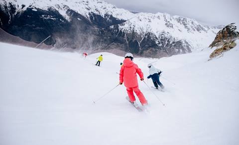 Teens ripping it up on an open slope